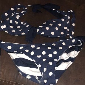 Navy and white polka dot two piece swimsuit